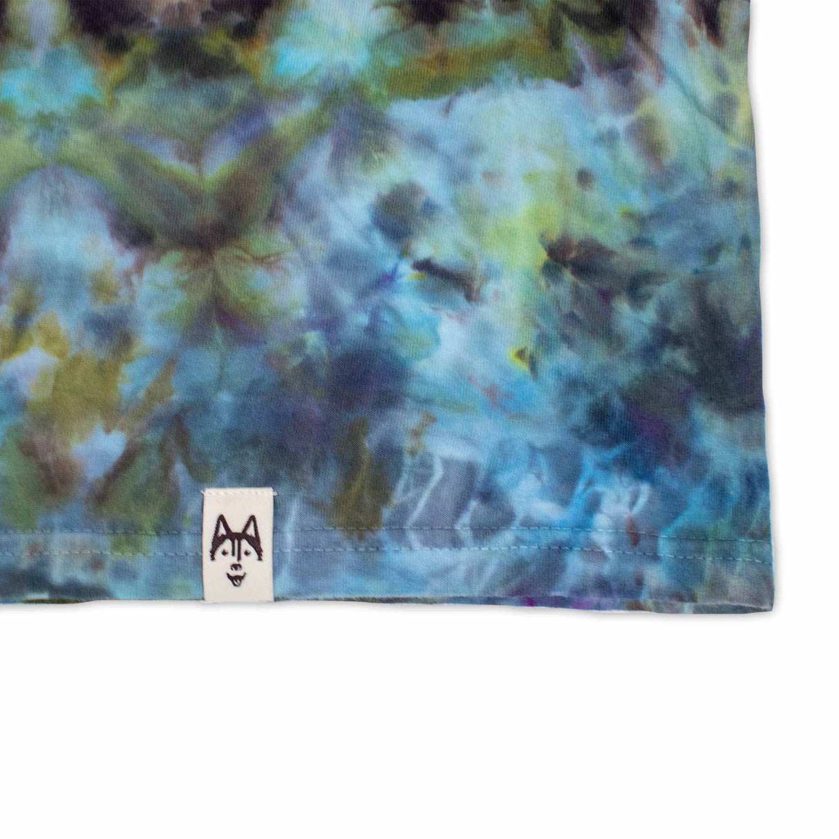 An ice dye long sleeve t-shirt that combines the tranquility of blue and green hues in a soft, inviting fabric perfect for cooler days.