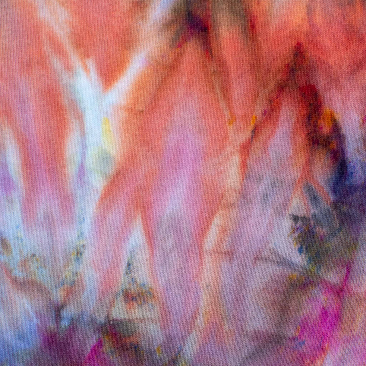 A pair of artistic ice-dyed sweatpants, with a dynamic mix of cobalt, fiery orange, and deep lilac, evoking a sense of abstract expressionism.