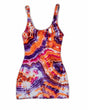 An electric ice-dyed jumpsuit with psychedelic patterns that dance across the fabric in hues of electric violet, burnt orange, and deep purple..